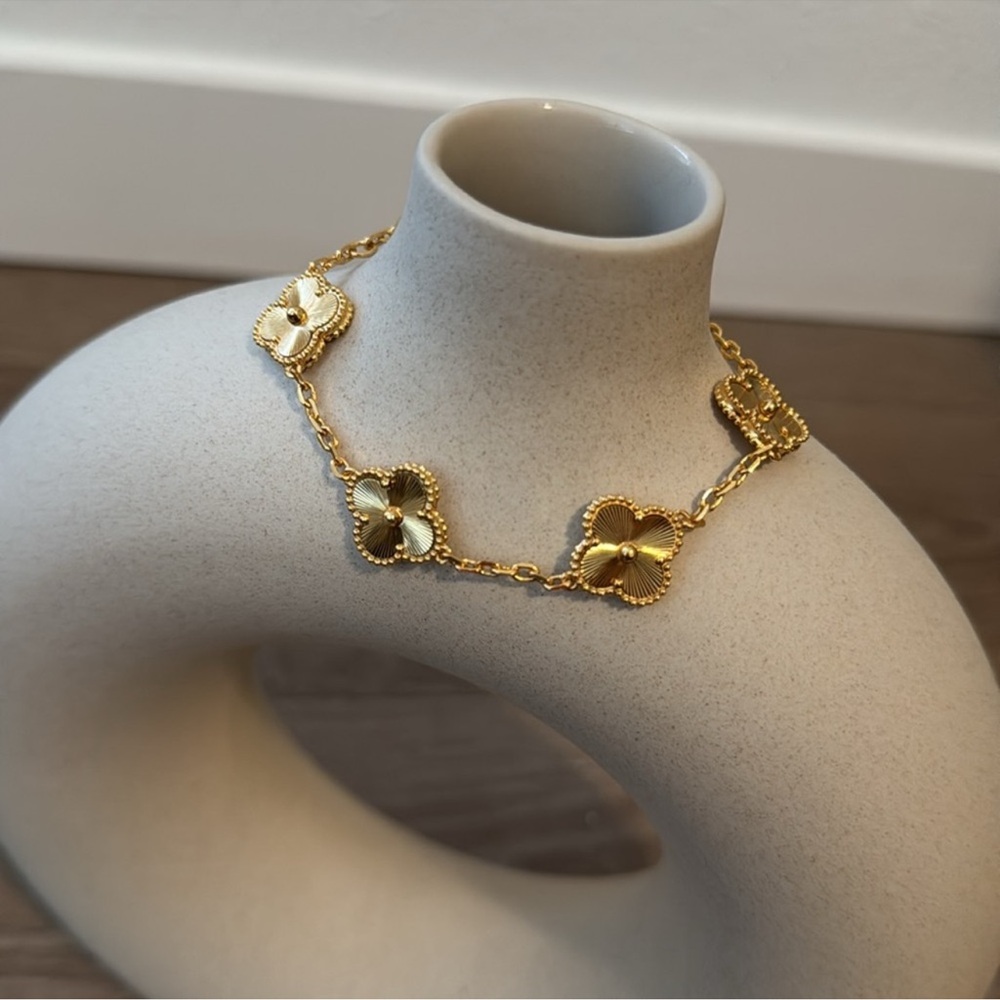 Five Clover Motif Gold Bracelet